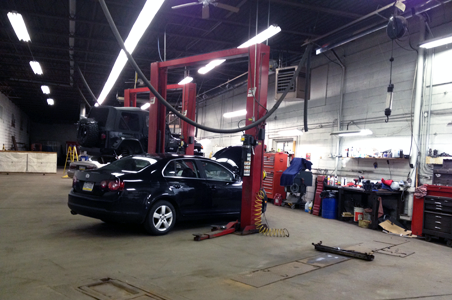 Lossie’s Auto service clean, state of the art facility utilizes state of the art equipment like the vehicle alignment equipment shown here.